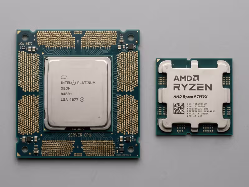 Server CPU beside smaller desktop CPU Server CPU beside smaller desktop CPU